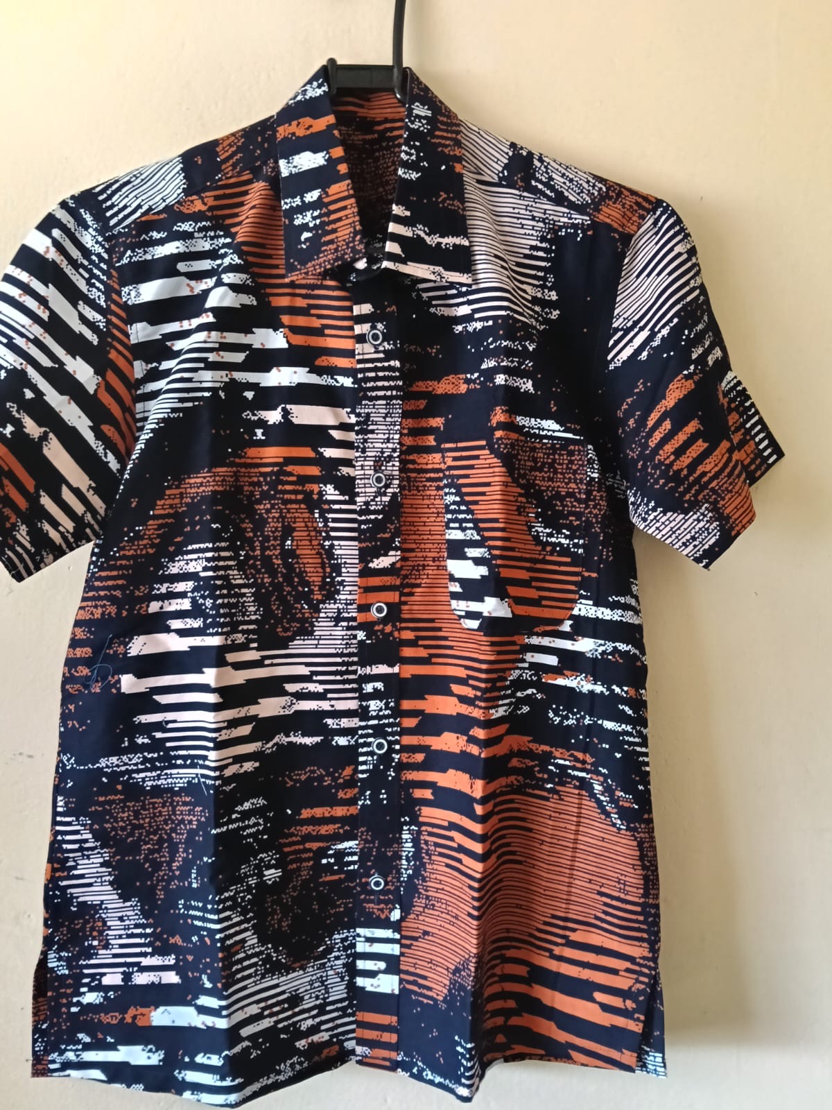 Orange, navy and white printed shirt